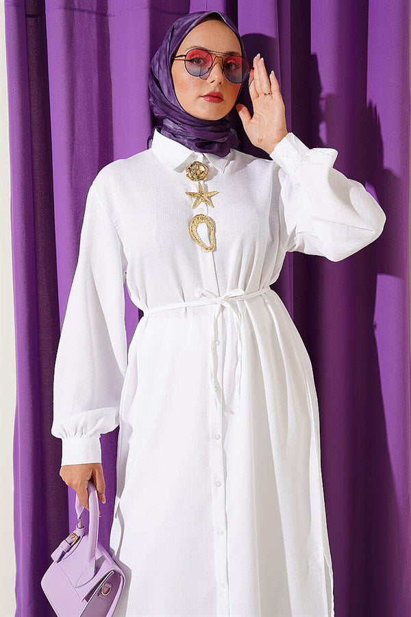 2 Piece Set in white with gold accessories and symbolic design.
