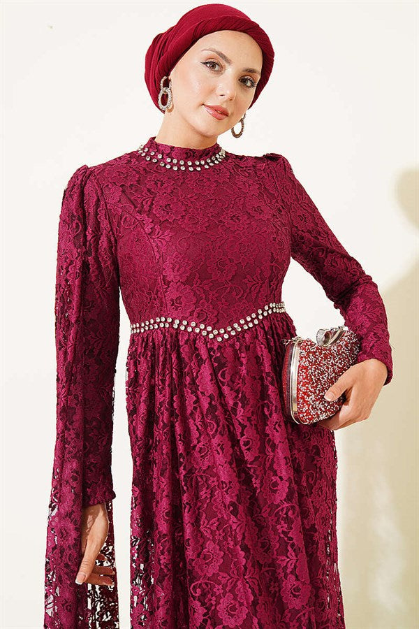Burgundy Evening Dress with Row of Stones, Lace, and Shoulder Cape.