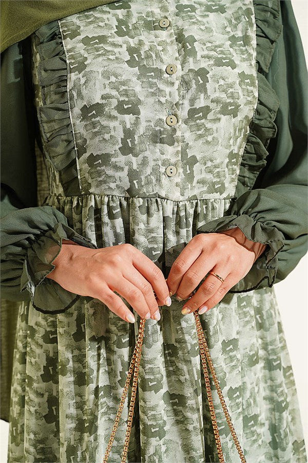 Green Chiffon Dress with Ruffled Collar and Pattern