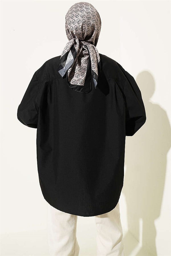 Loose-fitting shirt with drawstring collar, black.