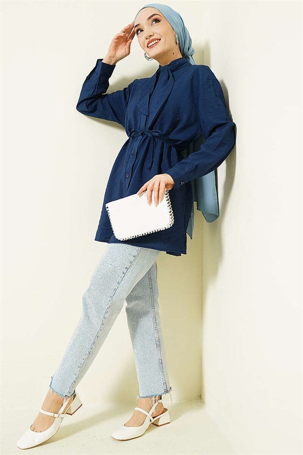 Loose-fitting shirt with tie collar, navy blue.