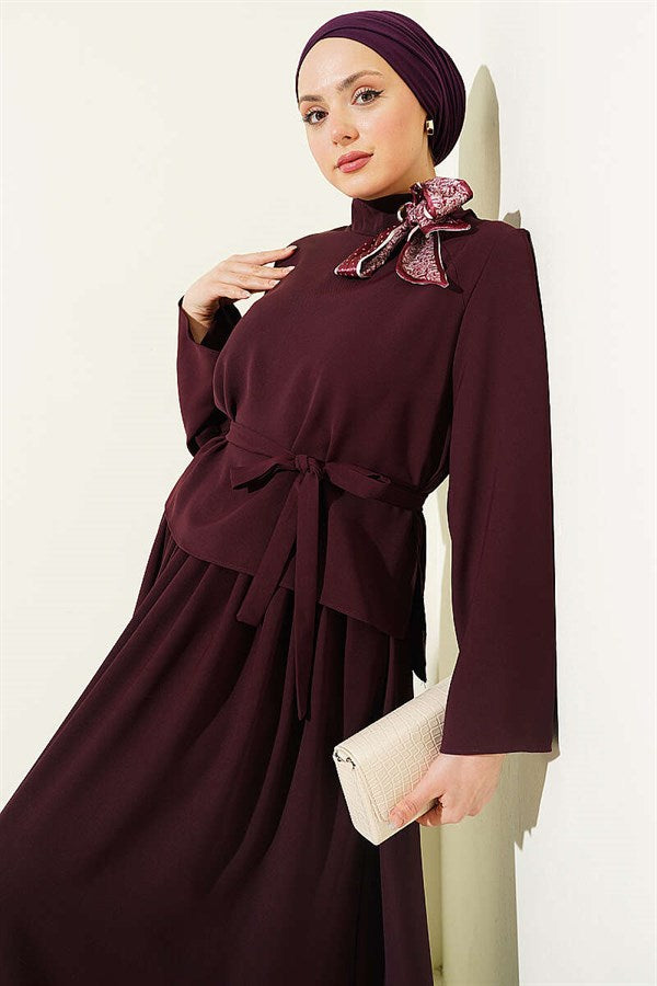 2 Piece Set with skirt and scarf detail, in plum color.