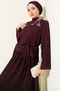 2 Piece Set with skirt and scarf detail, in plum color.