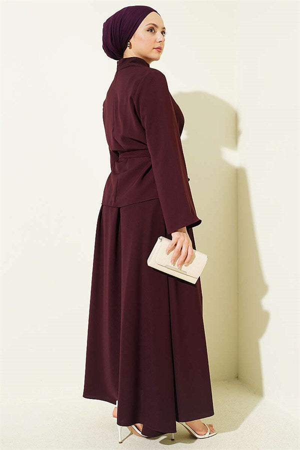 2 Piece Set with skirt and scarf detail, in plum color.