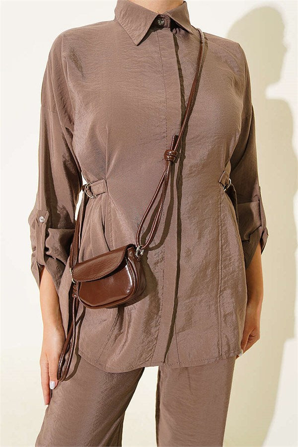 2 Piece Set in mink color with hidden button closure and buckle detail on the sides.