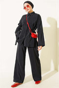 2 Piece Set with hidden buttons and buckle closure on the sides, black.