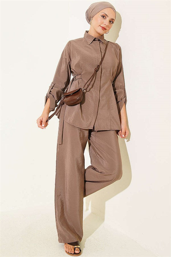 2 Piece Set in mink color with hidden button closure and buckle detail on the sides.