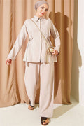 2 Piece Set with hidden buttons and buckle closure on the sides, beige.