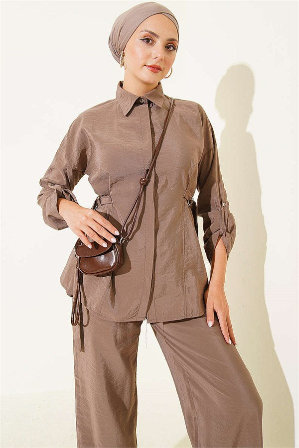 2 Piece Set in mink color with hidden button closure and buckle detail on the sides.